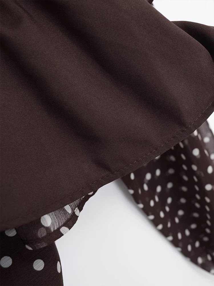 Riviera | Elegante blusa con lazo delantero