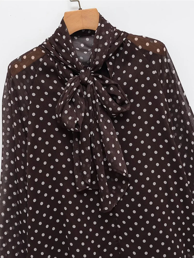 Riviera | Elegante blusa con lazo delantero