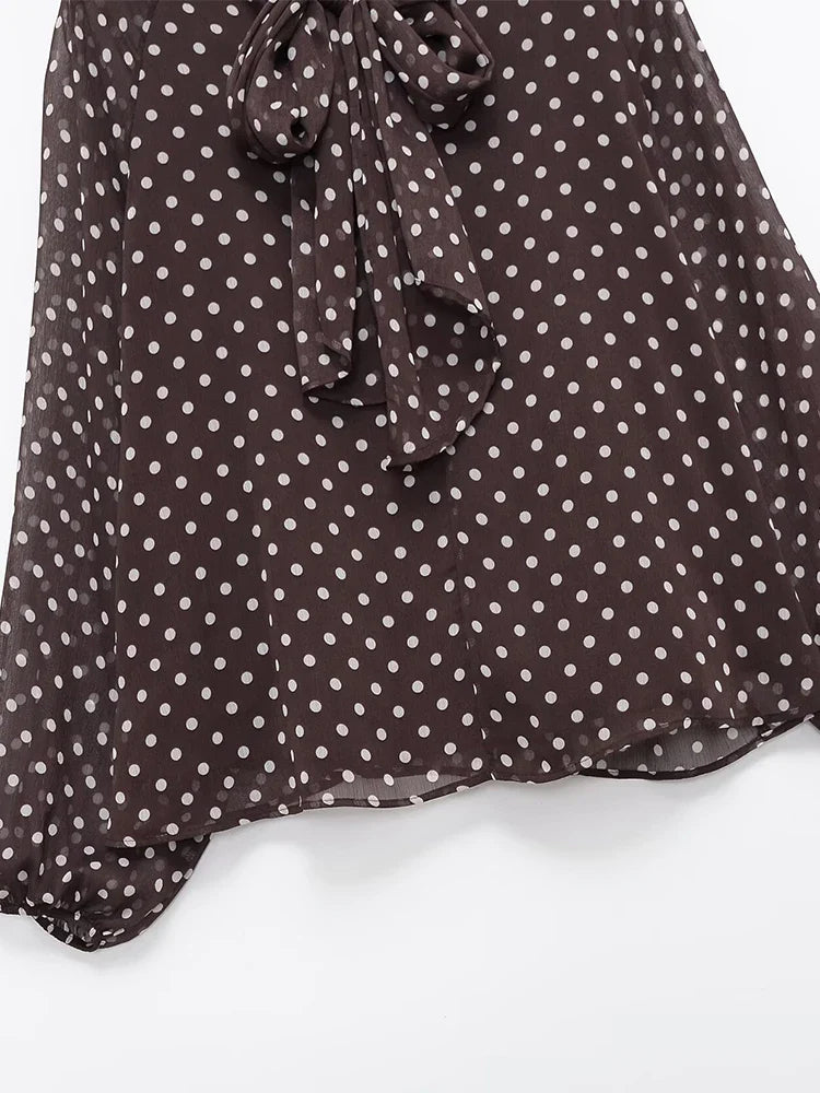 Riviera | Elegante blusa con lazo delantero