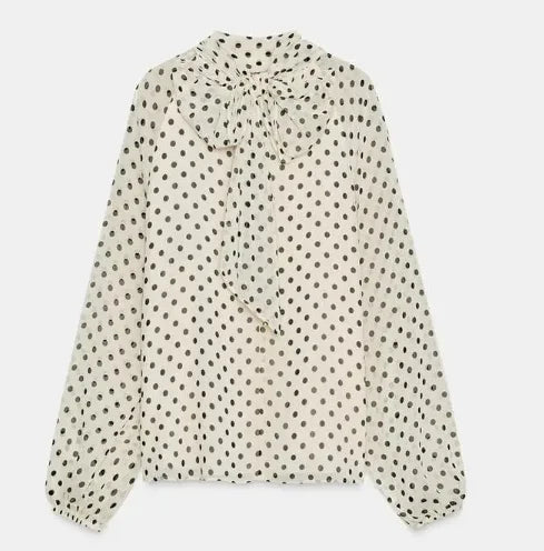 Riviera | Elegante blusa con lazo delantero